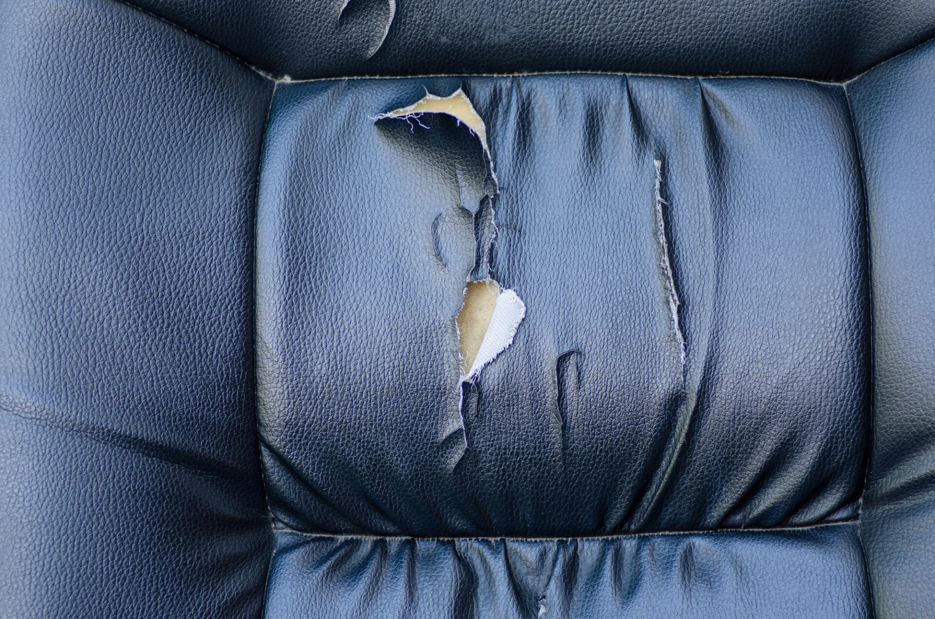 Budgeting for a move don't sacrifice so much that you have cheap movers damage your furniture. Here is a result of what can happen to your leather couch.